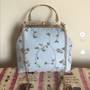 kiss lock lace bag